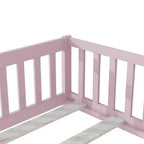 Cama individual de plataforma baja rosa con barandillas